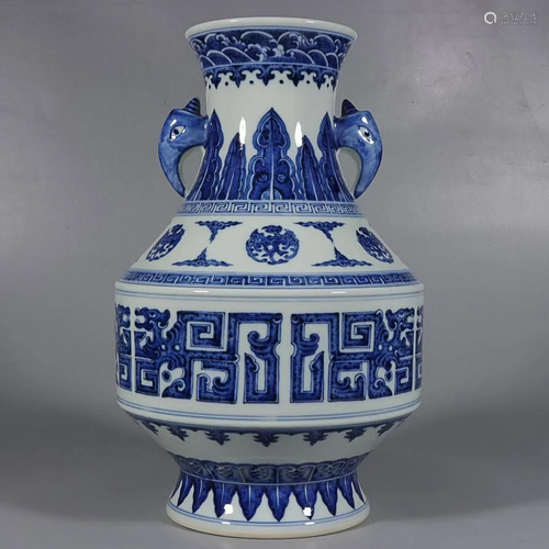 CHINESE BLUE-AND-WHITE ELEPHANT-HANDLED VASE DEPICTING '...