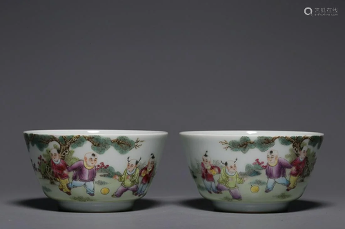 TWO CHINESE FAMILLE-ROSE CUPS DEPICTING 'CHILDREN AT PL...