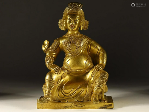 CHINESE GILT-BRONZE FIGURE OF CAISHEN