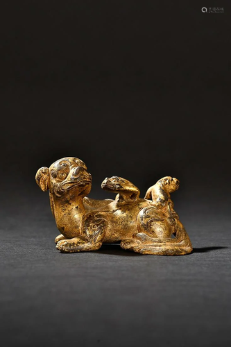 CHINESE GILT-BRONZE AUSPICIOUS BEAST-FORM PAPERWEIGHT