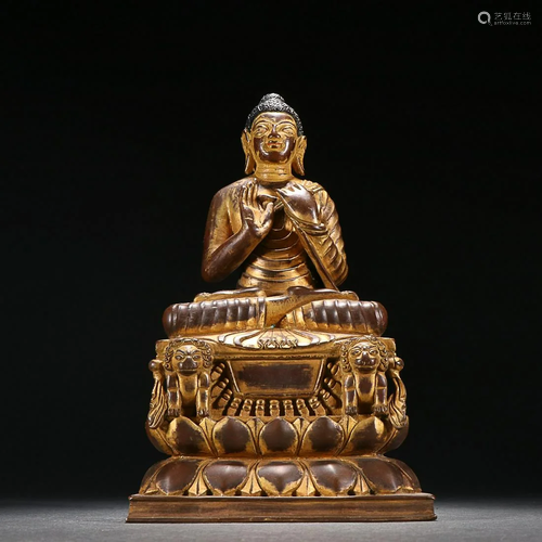 CHINESE GILT-BRONZE FIGURE OF SAKYAMUNI