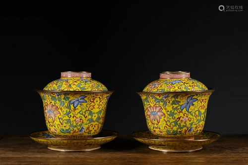 TWO CHINESE CANTON ENAMEL COVERED BOWLS DEPICTING 'FLOR...