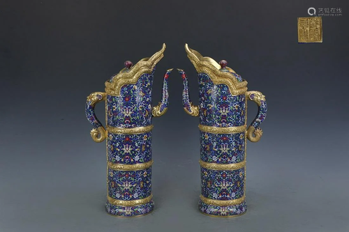 TWO CHINESE CLOISONNE ENAMEL EWERS DEPICTING 'FLORAL SC...