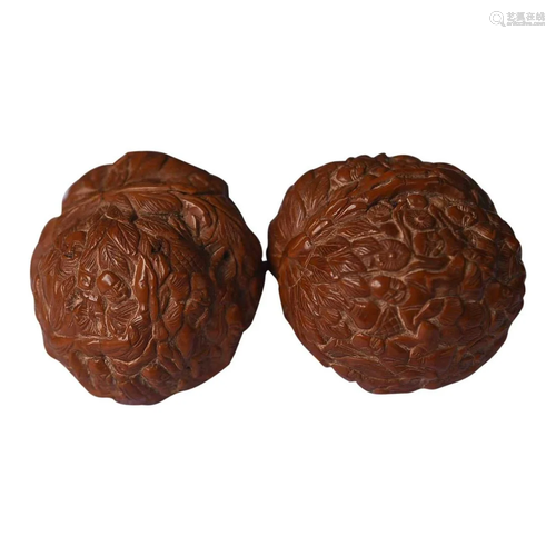 CHINESE WALNUT BAODING BALLS WITH CARVED 'ARHAT'