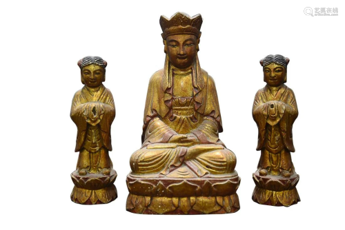 THREE GILT WOOD FIGURES OF BUDDHAS