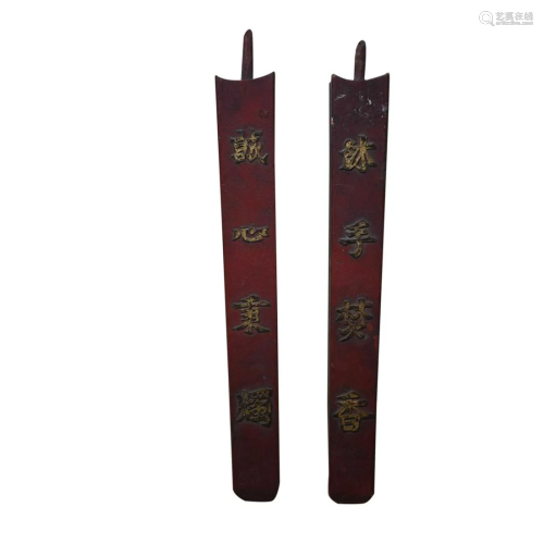 TWO CHINESE INSCRIBED WOOD CANDLE HOLDERS