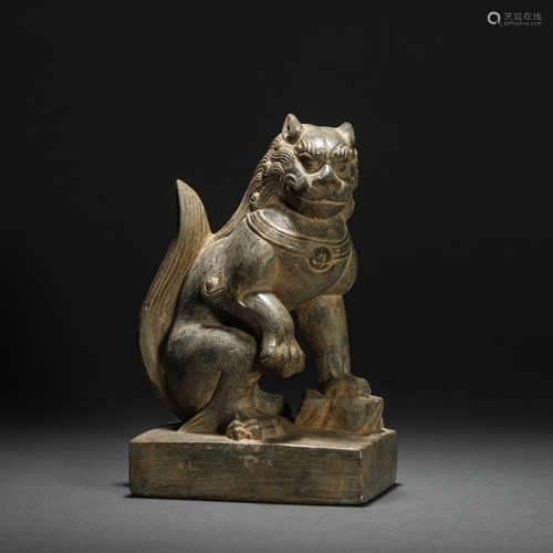 Tang Dynasty bluestone lion seated statue