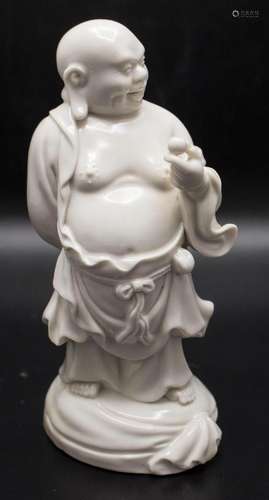 Porzellanfigur  Buddha mit Pfirsich  / A porcelain figure  B...