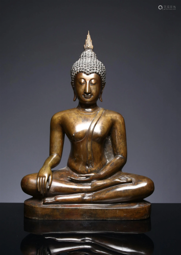 A Large Bronze Figure of a Seated Buddha