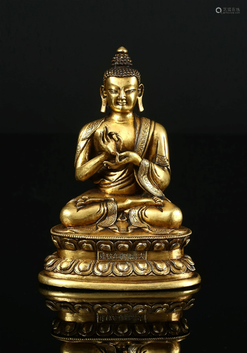 A Gilt Bronze Figure of a Seated Buddha