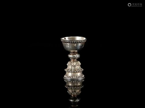 A Tibetan silver butter lamp