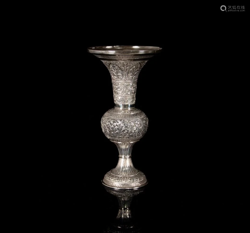 A silver repoussÃ© vase