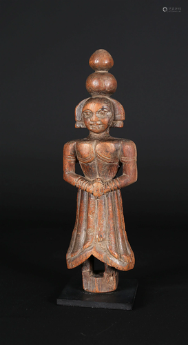 Indian carved wooden figure of a Brahmin