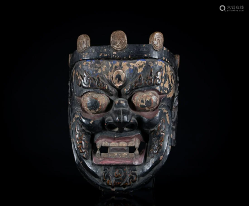Three Tibetan Painted Wooden Masks of Mahakala
