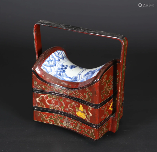 A Chinese lacquered wood and porcelain travel box