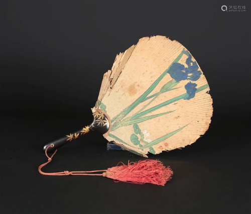 A Japanese fan with gilt lacquered handle