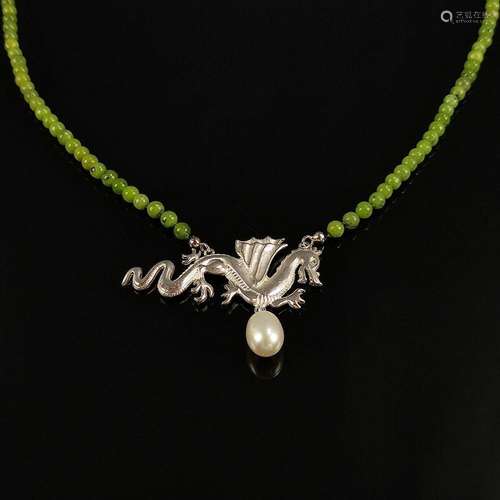 Jade necklace with lucky dragon, silver 935, 17,7g, in the c...