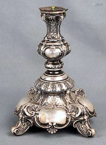 Antique candlestick, baroque shape, on four rolled acanthus ...