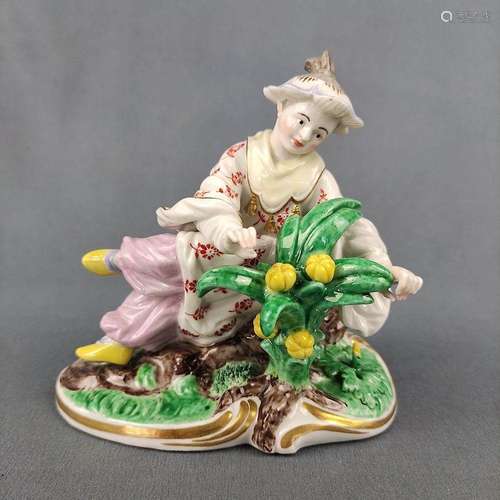 Figurine in chinoiserie style, Nymphenburg/ Frankenthal, sit...