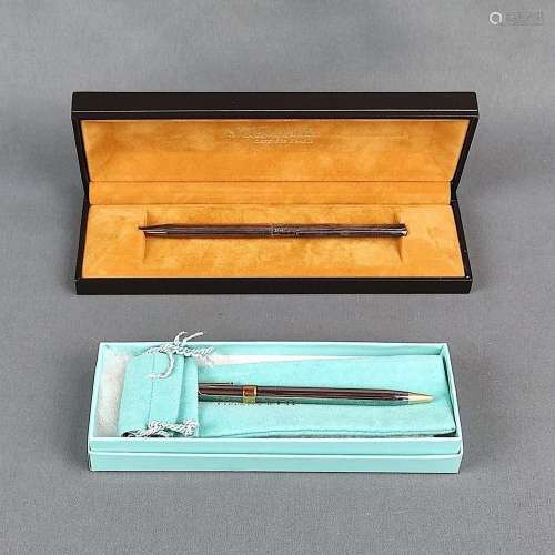 Two writing utensils, Tiffany & Co. and S.T. Dupont, con...