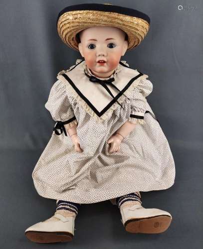 Large doll made by J. D. Kestner, with blue eyes and open mo...