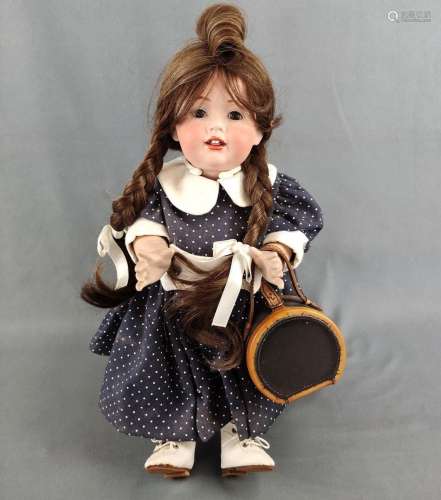 Doll by J.D. Kestner, in dark blue dress with dots with whit...
