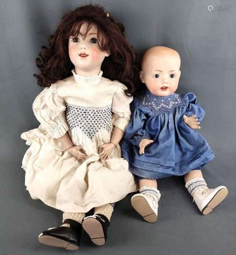 Two porcelain head dolls, large doll with brown curls, brown...