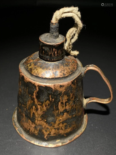 A Delicate Copper Oil Lamp