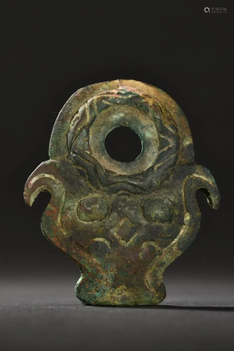 A Rare Bronze Pendant