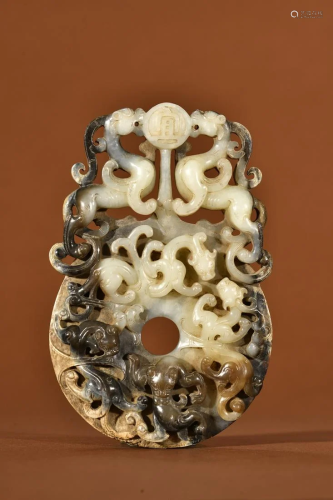 A Rare Jade Carved Dragon Disc