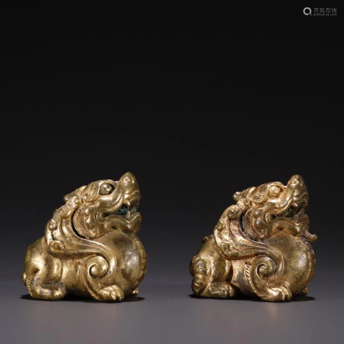 A Pair of Gilt-bronze Beast Ornaments