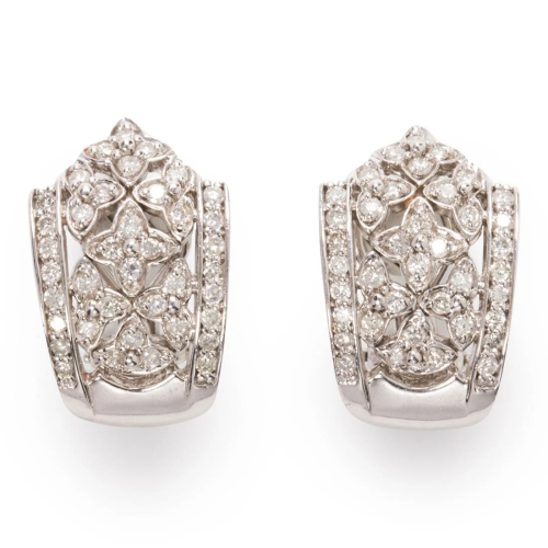 A pair of diamond and fourteen karat white gold ear clips