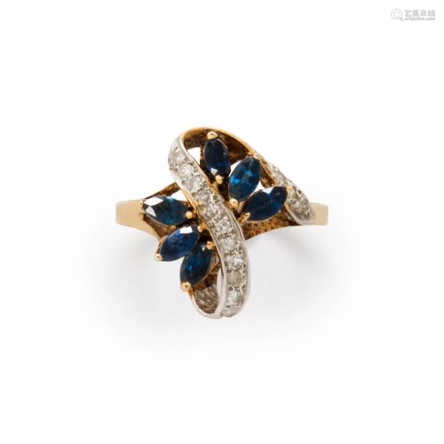 A sapphire, diamond fourteen karat gold ring