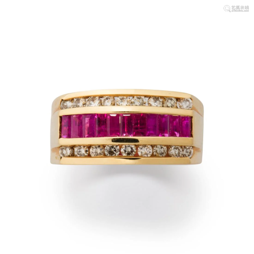 A ruby, diamond and fourteen karat gold band ring