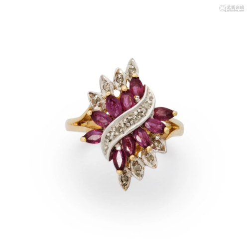 A ruby, diamond and ten karat bi-color gold ring