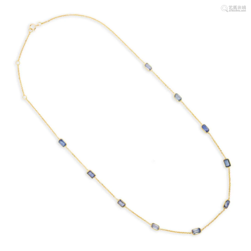 A sapphire and eighteen karat gold necklace