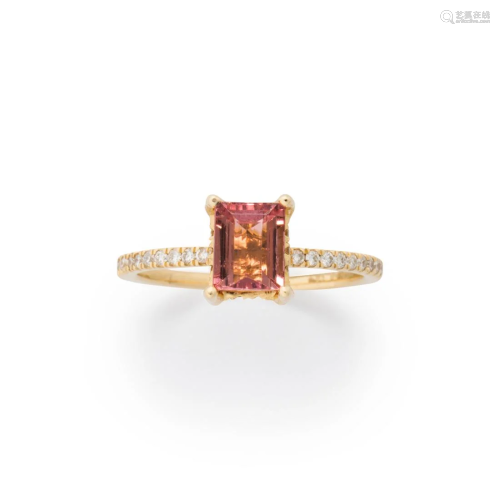 A pink tourmaline, diamond and fourteen karat gold ring