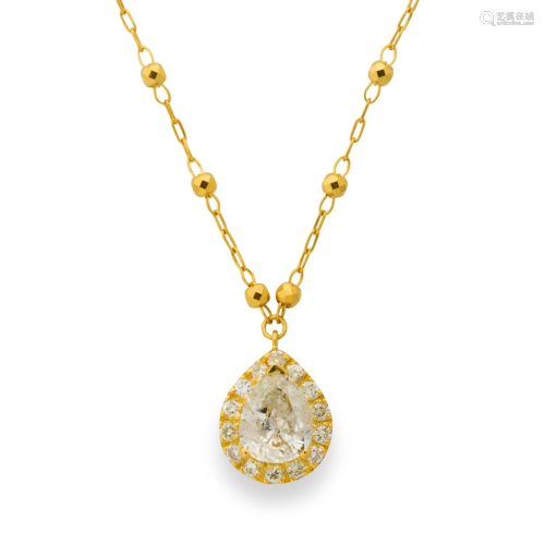 A diamond and eighteen karat gold pendant necklace