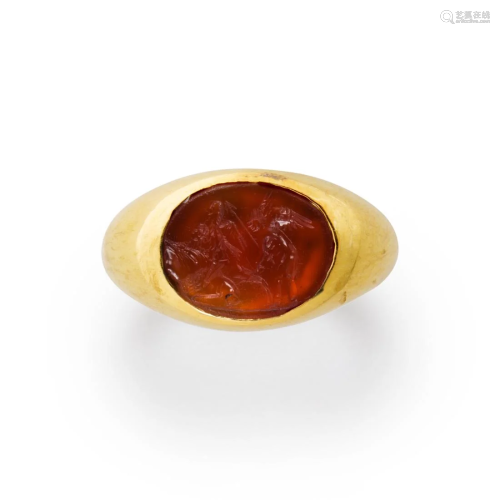 A carnelian and eighteen karat gold ring