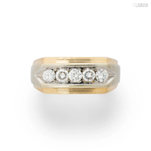 A diamond and fourteen karat bi-color gold ring