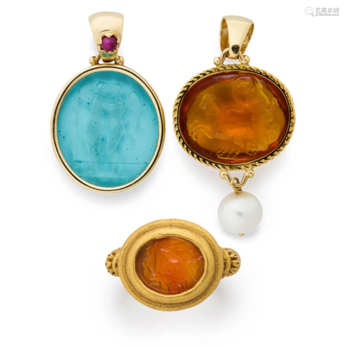A group of gemstone or glass and gold jewelry