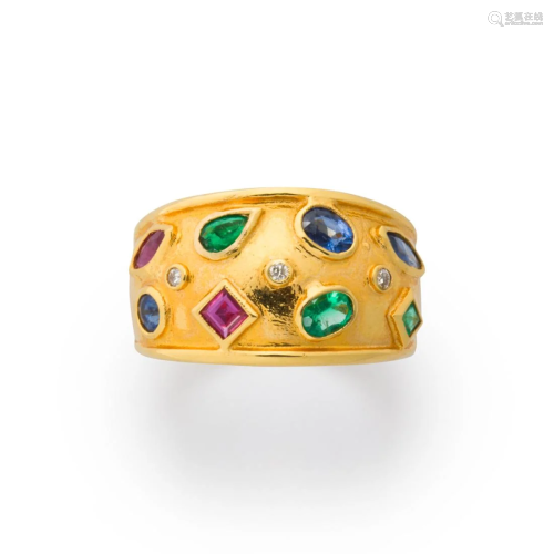 A gemstone and fourteen karat gold ring