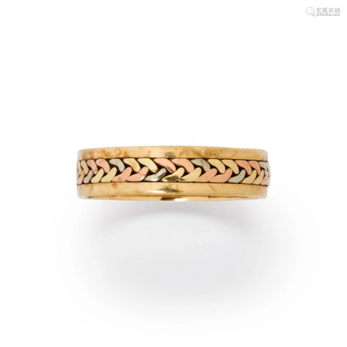 A fourteen karat tri-color gold ring