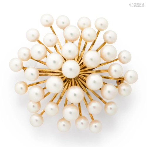 A cultured pearl and fourteen karat gold brooch
