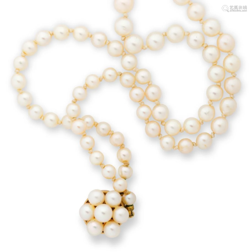A pearl and fourteen karat gold necklace