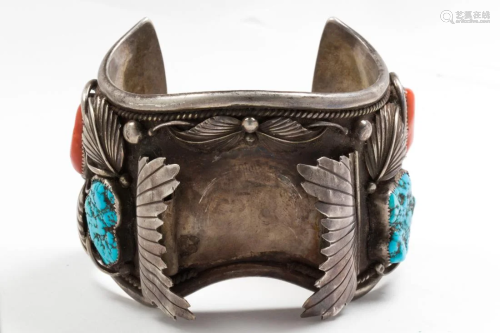 A Navajo turquoise and coral mounted cuff bracelet