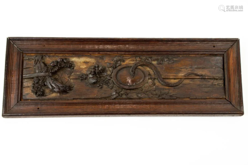 A Continental Neoclassical carved wood relief panel