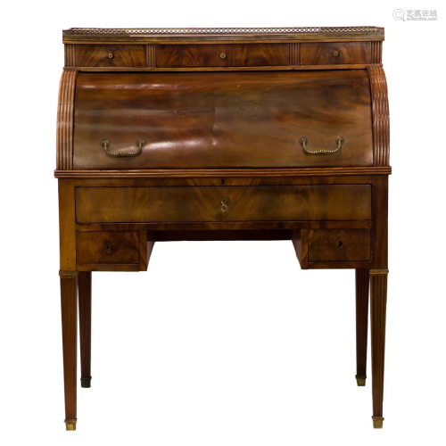A George III figured mahogany cylinder writing desk circa 17...