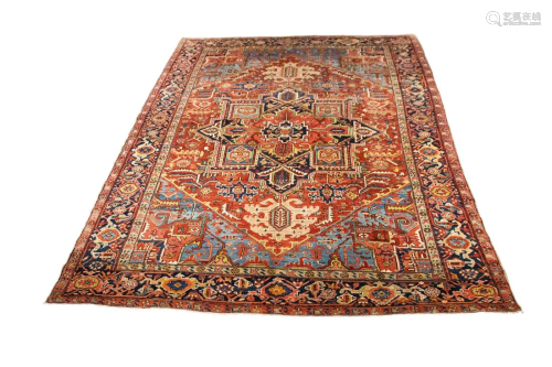 An antique Heriz carpet