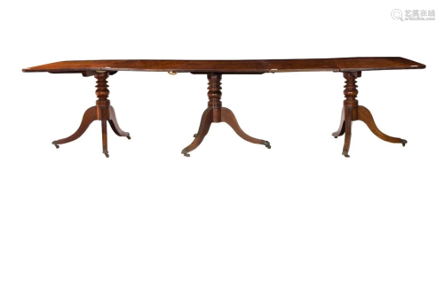 A Regency mahogany triple pedestal banquet table